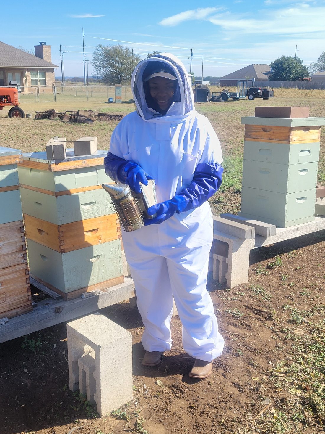 Mary in the bee suit at the McGregor bee yard